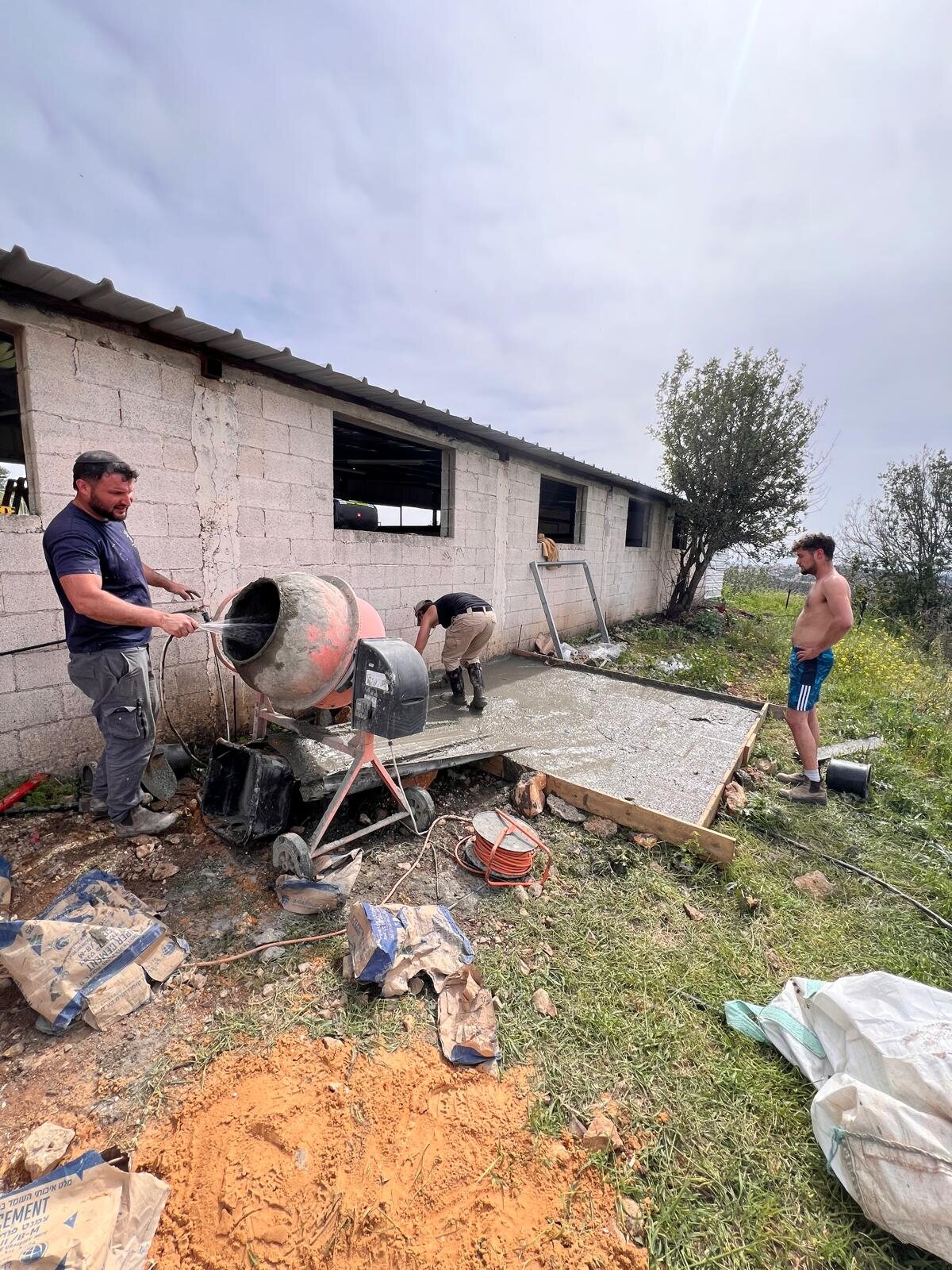 Mixing concrete together