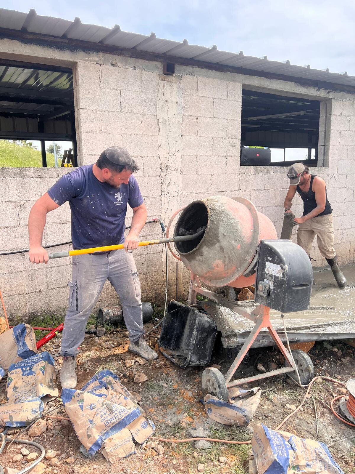 Working the cement mixer