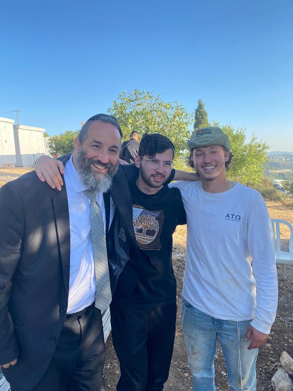Rabbi Tzvi with the team